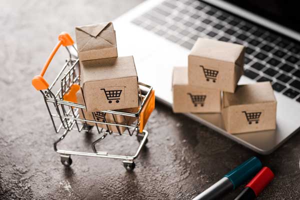 E-commerce shopping cart on laptop